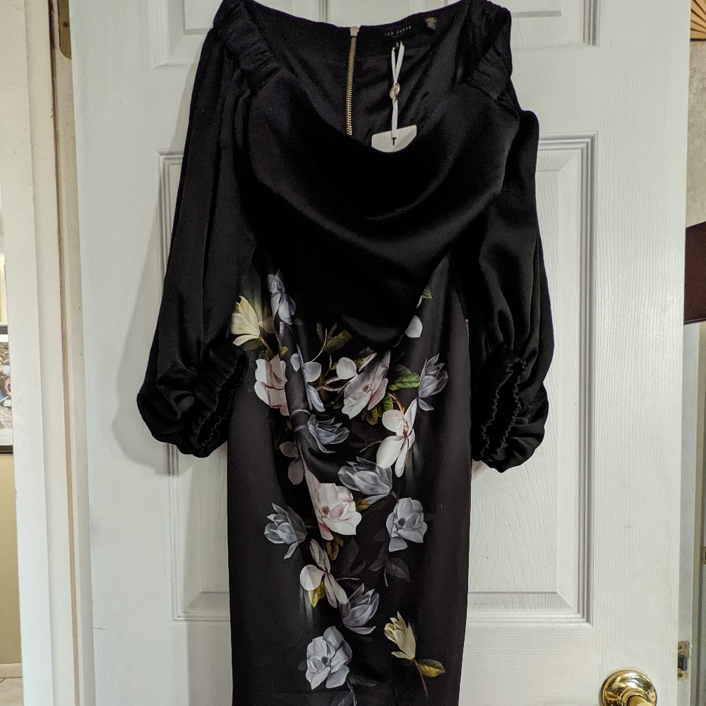 Ted Baker. Black Off Shoulder Dress with Puffy Sleeves and White Floral Accents.